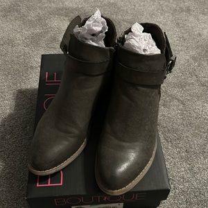 Boutique practically brand new box says color is khaki